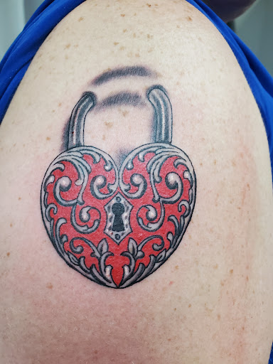 Explore spinal cord tattoo ideas, creative tattoo ideas in Lawrence, available at Skin Illustrations Tattoos & Piercings