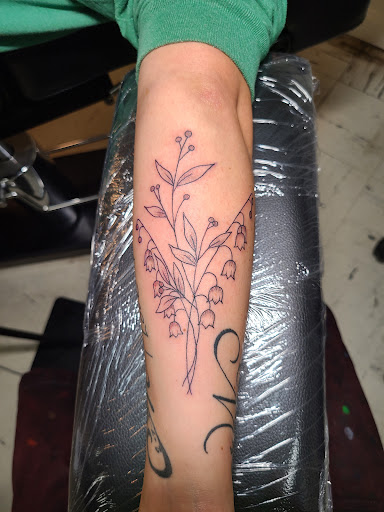 Explore heart with wings tattoo ideas, creative tattoo ideas in Meadville, available at Lucky Lucys Tattoo and Art Studio