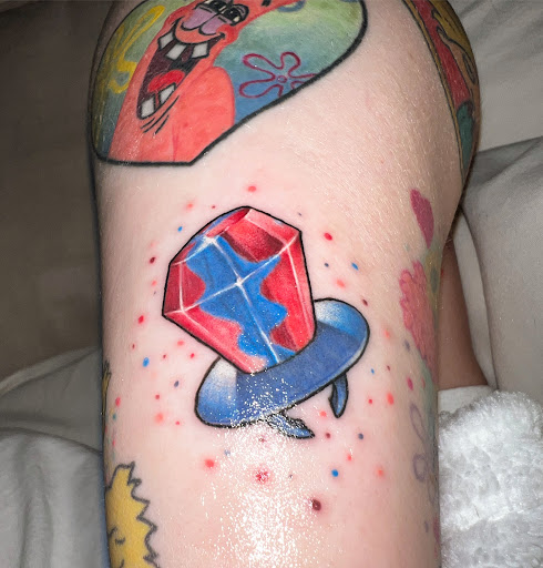 Explore red string of fate tattoo ideas, creative tattoo ideas in Staten Island, available at Bullseye Tattoos