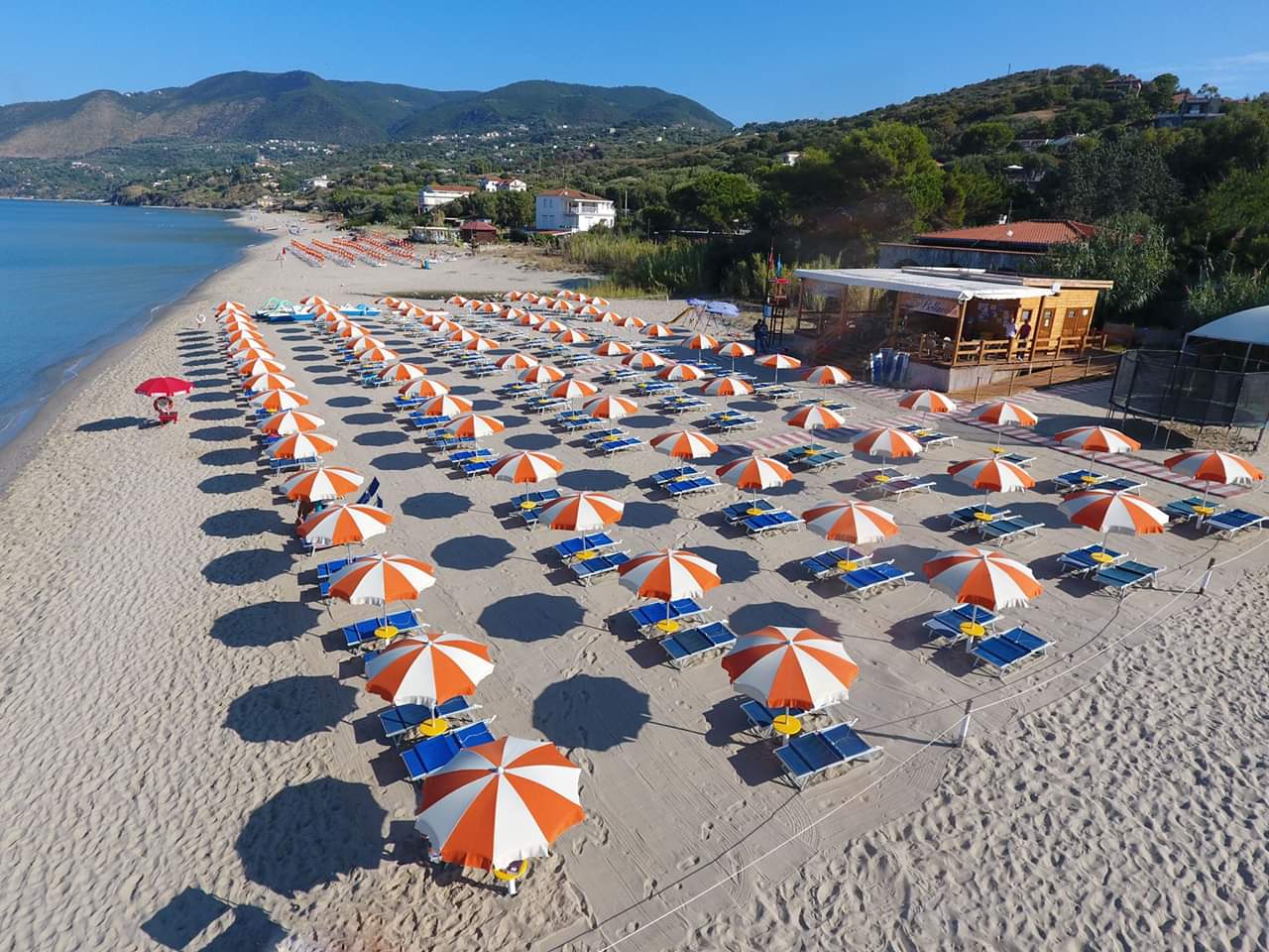 Foto av Spiaggia Le Saline med lång rak strand