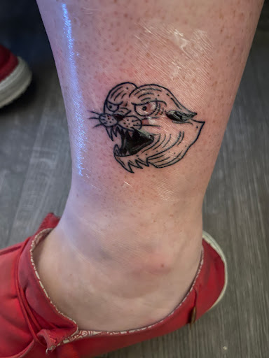 Explore salmon tattoo ideas, creative tattoo ideas in College Station, available at The Ineffable Tattoo Experience