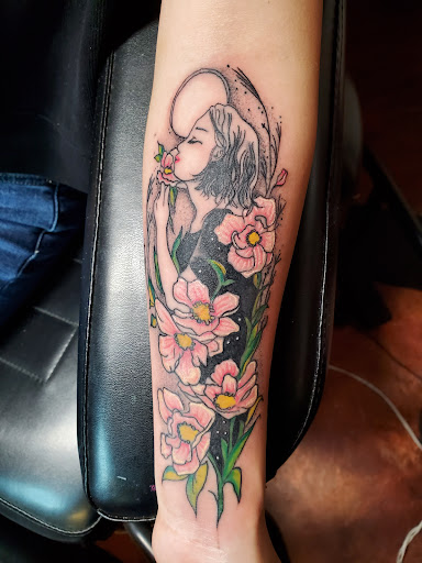 Explore cute flower tattoo ideas, creative tattoo ideas in Inverness, available at The Perfect Spot Tattoos
