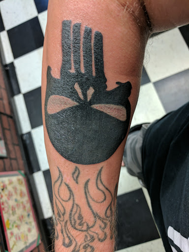 Explore mushu tattoo ideas, creative tattoo ideas in Addison, available at Rising Phoenix Tattoo and Body Piercing