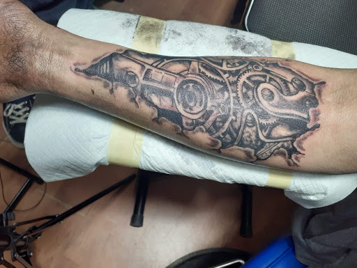 Explore gnome tattoo ideas, creative tattoo ideas in Tilton, available at Pair A Dice Tattoo LLC