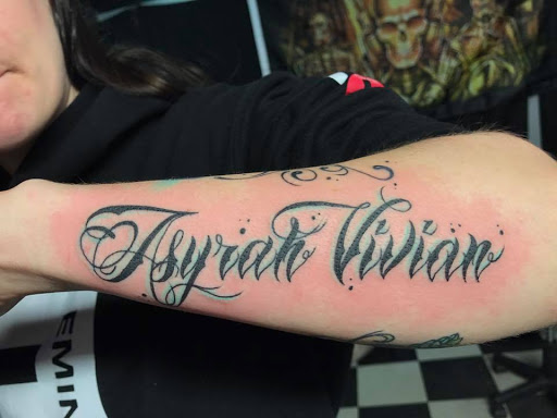 Explore 2002 tattoo ideas, creative tattoo ideas in Nampa, available at Temptation Tattoo & Body Piercing