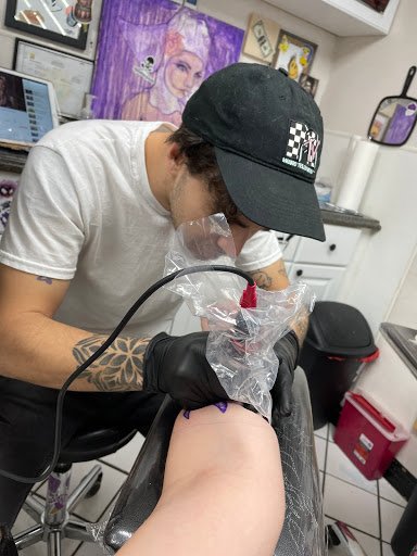 Explore wedding ring tattoo ideas for men, creative tattoo ideas in Panama City Beach, available at Oxygen Tattoo and Body Piercing Studio