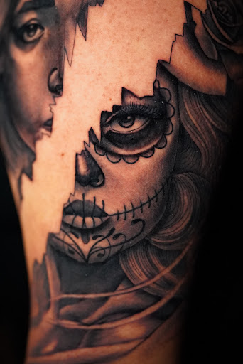 Explore blackout cover up tattoo ideas, creative tattoo ideas in Stockbridge, available at Black Rose Tattoo Collective