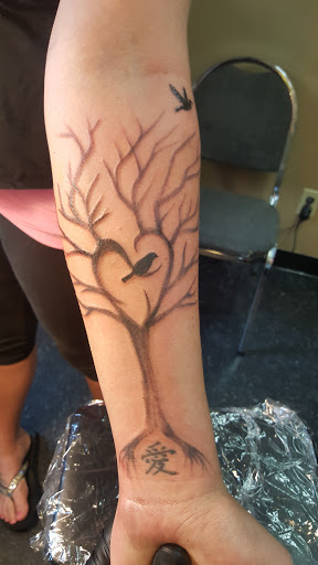 Explore latin tattoo ideas, creative tattoo ideas in Akron, available at Absolute Tattoo Company