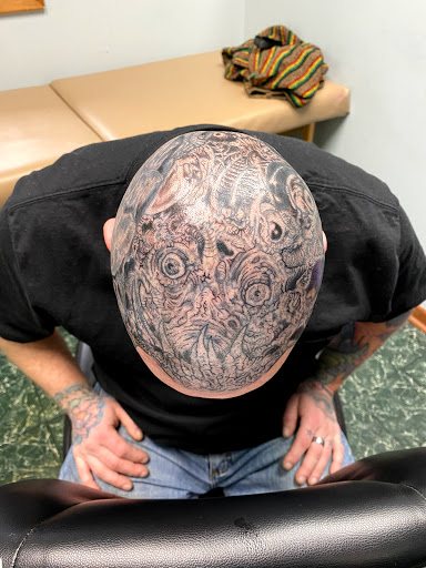 Explore rose idea tattoos, creative tattoo ideas in Aurora, available at Ronin Tattoo Studio INC