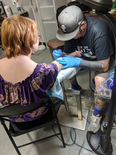 Explore hand cover up tattoo ideas, creative tattoo ideas in Mount Juliet, available at Division Street Tattoo Company