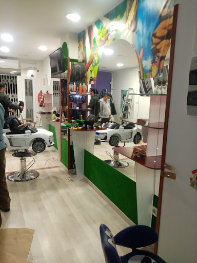 Peluquería y Barbería AZIZ en Alcañiz, Teruel