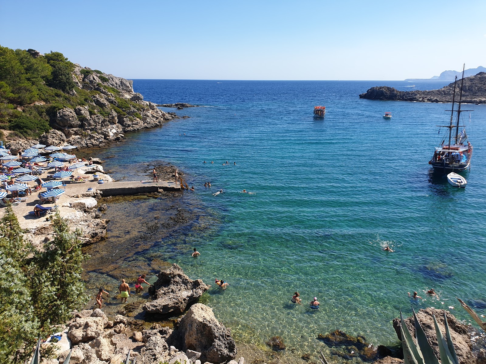 Photo of Ladiko Beach with rocks cover surface