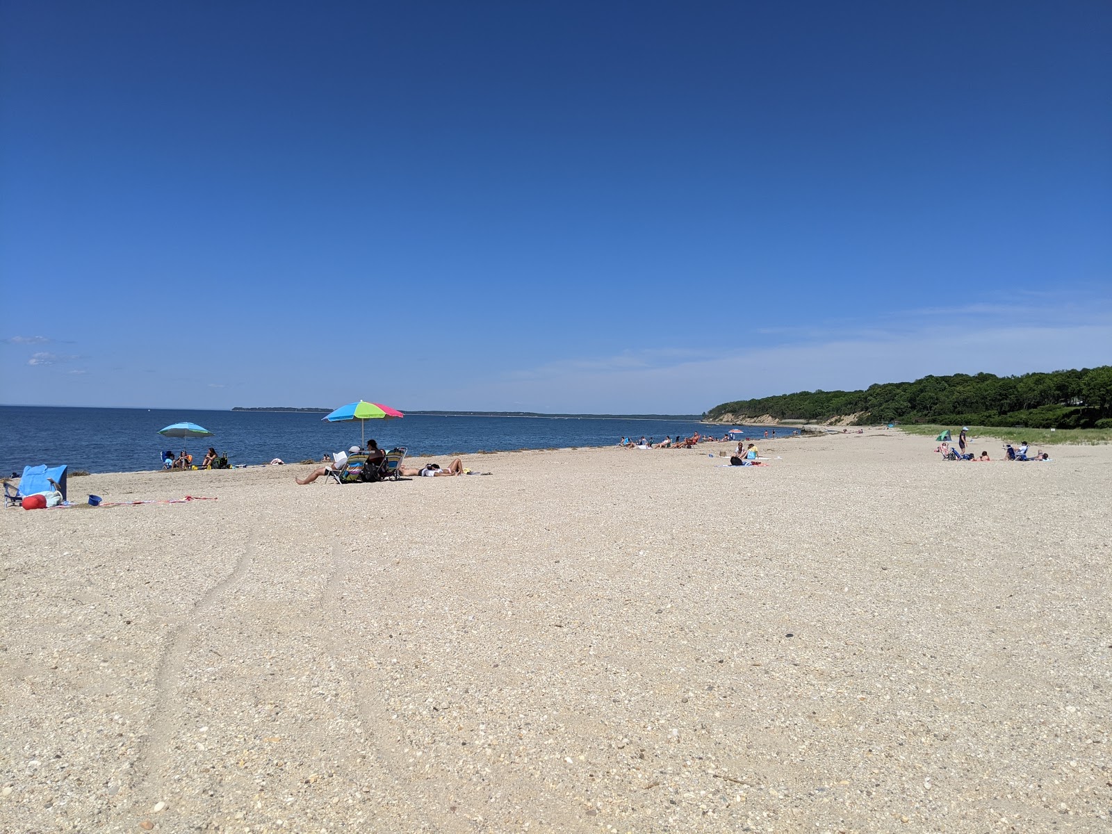 Fotografija Short Beach z svetel pesek površino