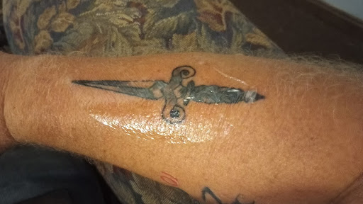 Explore twice tattoo ideas, creative tattoo ideas in Covington, available at Cupid Slave Tattoo Company