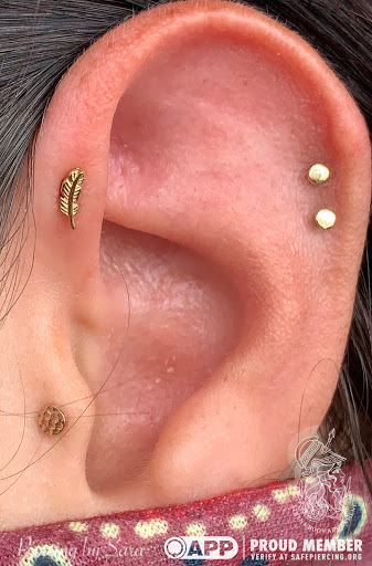 Find inbetween boob tattoo ideas for your next unique tattoo in Pompano Beach at Athena Body Adornment