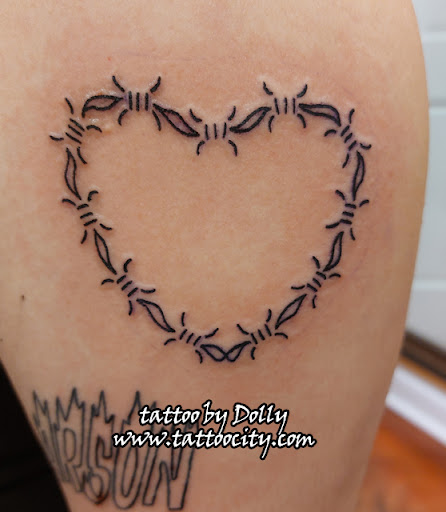 Explore back of head tattoo ideas, creative tattoo ideas in Lockport, available at Tattoo City by Larry Brogan