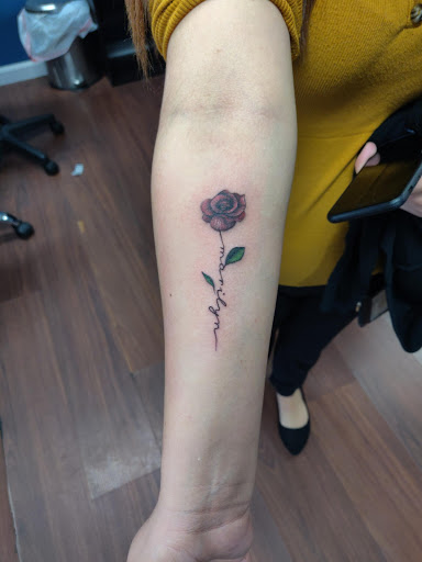 Explore throat tattoo ideas, creative tattoo ideas in Los Alamitos, available at Mr. Inkwells Classy Tattoos