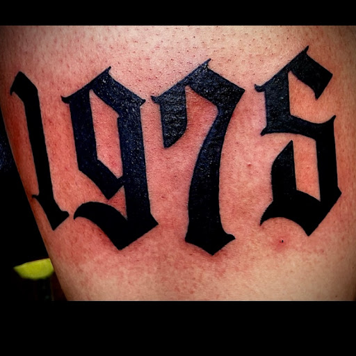 Explore rib tattoo cover up ideas, creative tattoo ideas in Camden, available at The Golden Goose Tattoo Studio