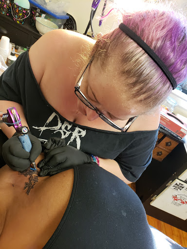Explore olive tattoo ideas, creative tattoo ideas in Raleigh, available at Conspiracy Ink Tattoos