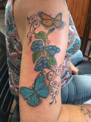 Explore st christopher tattoo ideas, creative tattoo ideas in Fairmont, available at Derma Doodlezz