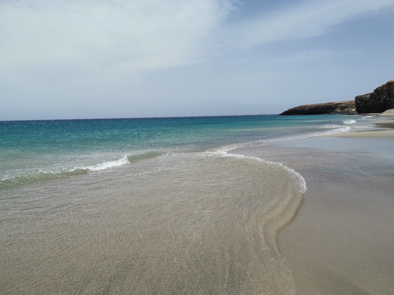 Photo de Playa Juan Gomez - endroit populaire parmi les connaisseurs de la détente