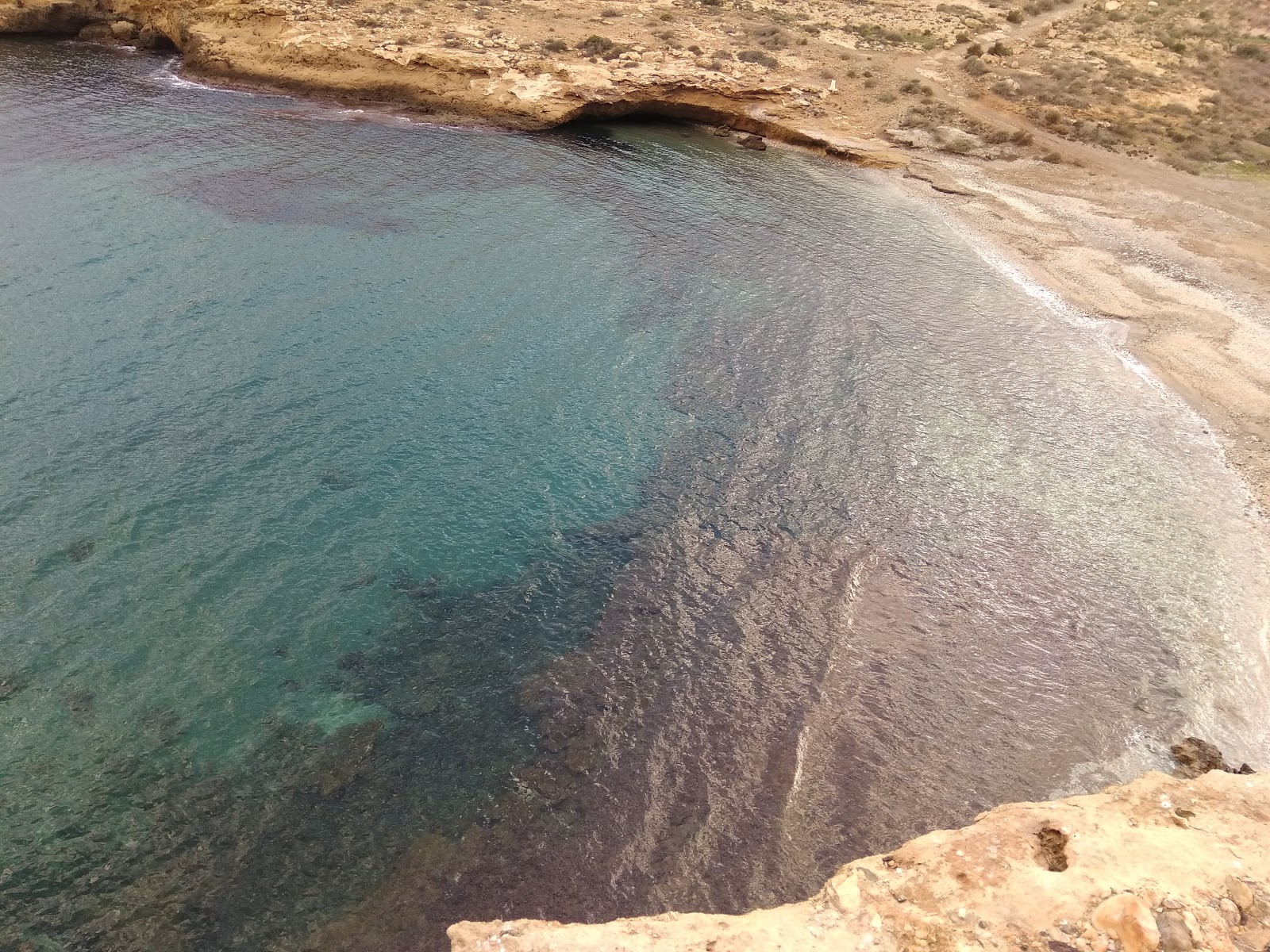 Foto von Cala Blanca mit kleine bucht