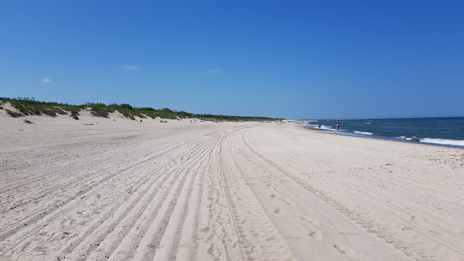 Valokuva Western Ustka Beachista. puhtaustasolla korkea