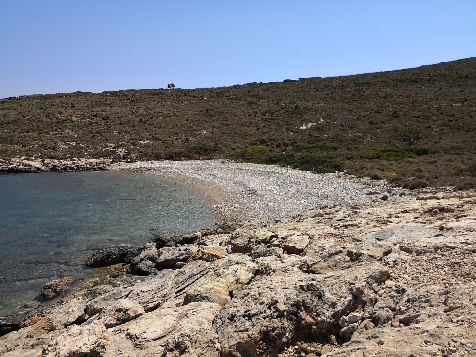 Foto van Hoclahoura beach met stenen oppervlakte