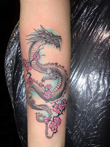 Explore women's ankle tattoo ideas, creative tattoo ideas in Roanoke, available at RailYard INK