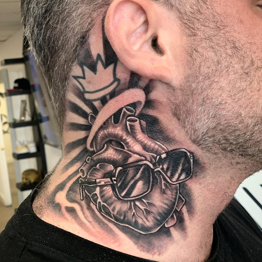 Explore dog love tattoo ideas, creative tattoo ideas in Maryland Heights, available at Thirteen Roses Tattoo & Aesthetics