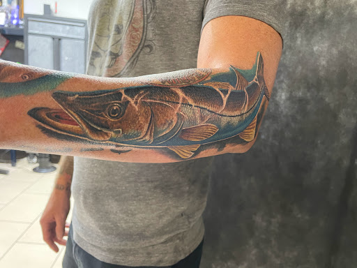 Find gemstone tattoo ideas for your next unique tattoo in Sarasota at SEVEN SINS Tattoo Studio