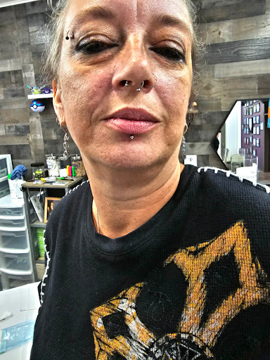 Explore cover up lower back tattoo ideas, creative tattoo ideas in Myrtle Beach, available at Elite Body Piercing