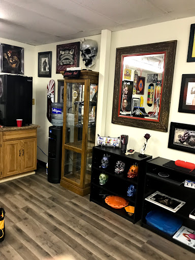 Explore barber tattoo ideas, creative tattoo ideas in Vermillion, available at IKTOMI-INK Tattoo Experience