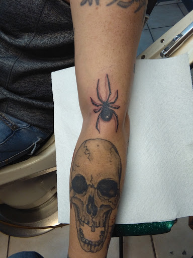 Explore mens side tattoo ideas, creative tattoo ideas in Bradenton, available at Memory Lane Tattoo Co.
