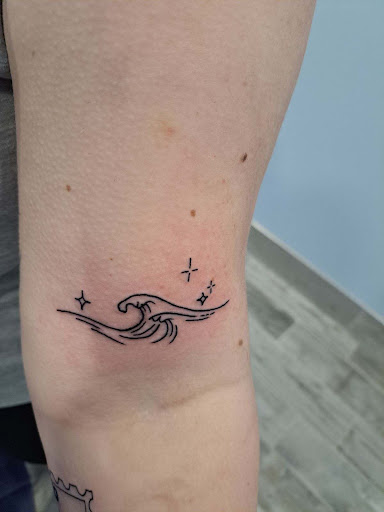 Explore softball tattoo ideas, creative tattoo ideas in Jacksonville, available at East Coast Worldwide Tattoo & Piercing