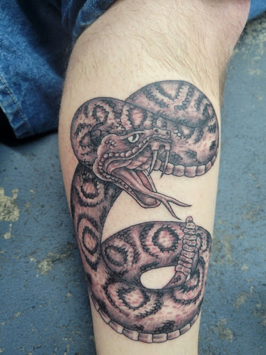 Explore slipknot tattoo ideas, creative tattoo ideas in Saint Albans, available at Red Dragon Tattoo