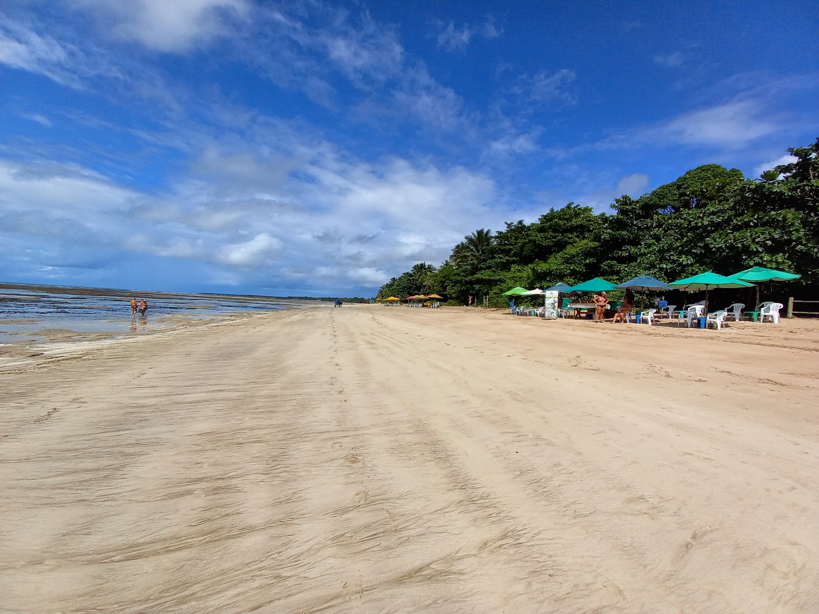 Quarta Praia'in fotoğrafı geniş plaj ile birlikte