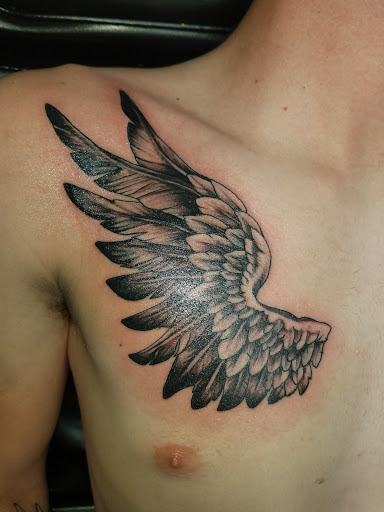 Explore vienna billy joel tattoo ideas, creative tattoo ideas in Cambridge, available at Skinworks Tattoo