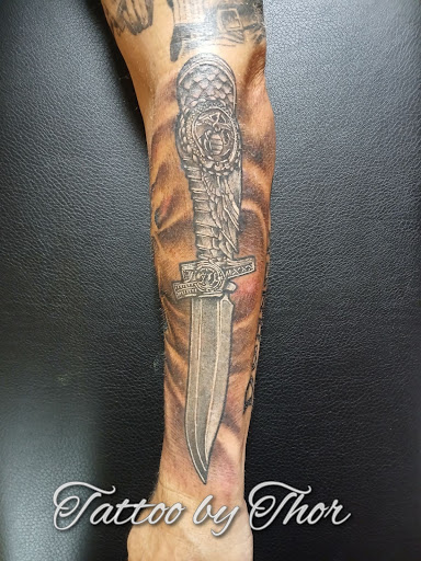 Explore hood tattoo ideas for men, creative tattoo ideas in San Tan Valley, available at Frontier Tattoo Company