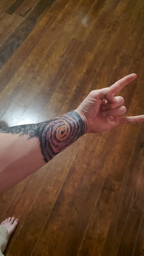 Explore back of the ear tattoo ideas, creative tattoo ideas in Thomasville, available at Top Ink