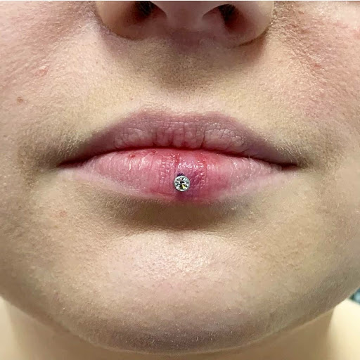 Explore eagle tattoo ideas for men, creative tattoo ideas in Charleston, available at Exotic Impressions Body Piercing