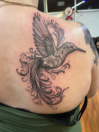 Explore origami tattoo ideas, creative tattoo ideas in Cocoa, available at Rorschach Tattoo Shop and Piercing Studio