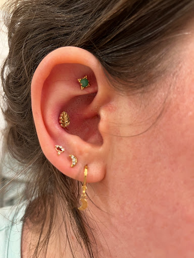 Explore neck tattoo ideas for females, creative tattoo ideas in Boston, available at Arcadia Body Piercing