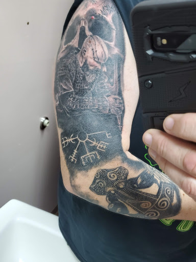 Explore half sleeve tattoo cover up ideas, creative tattoo ideas in Clawson, available at Eternal Tattoos