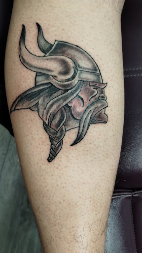 Explore snake tattoo ideas, creative tattoo ideas in Brodhead, available at Sinnin Skinn InkWorks