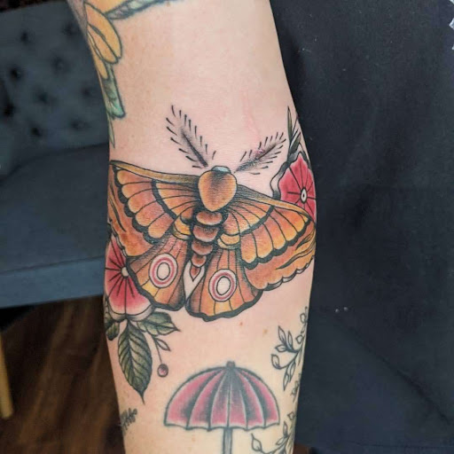 Explore wedding ring tattoo ideas for him, creative tattoo ideas in Lawrence, available at Standard Electric Tattooing
