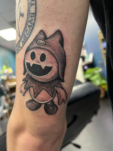 Find skull tattoo idea for your next unique tattoo in Grand Island at The Shaded Dahlia Piercing & Tattoo Parlor