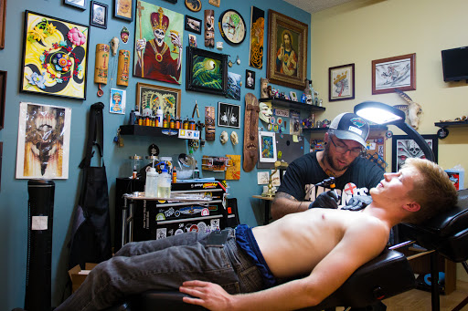 Explore cake tattoo ideas, creative tattoo ideas in Rochester, available at Sacred Heart Studios