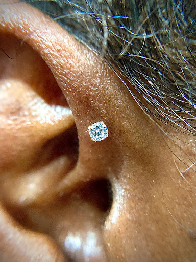 Explore back tattoo for women ideas, creative tattoo ideas in Orange, available at Symbiosis Body Piercing