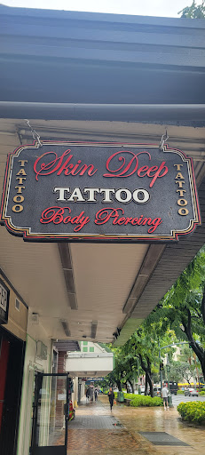Explore surfing tattoo ideas, creative tattoo ideas in Honolulu, available at Skin Deep Tattoo and Piercing Waikiki